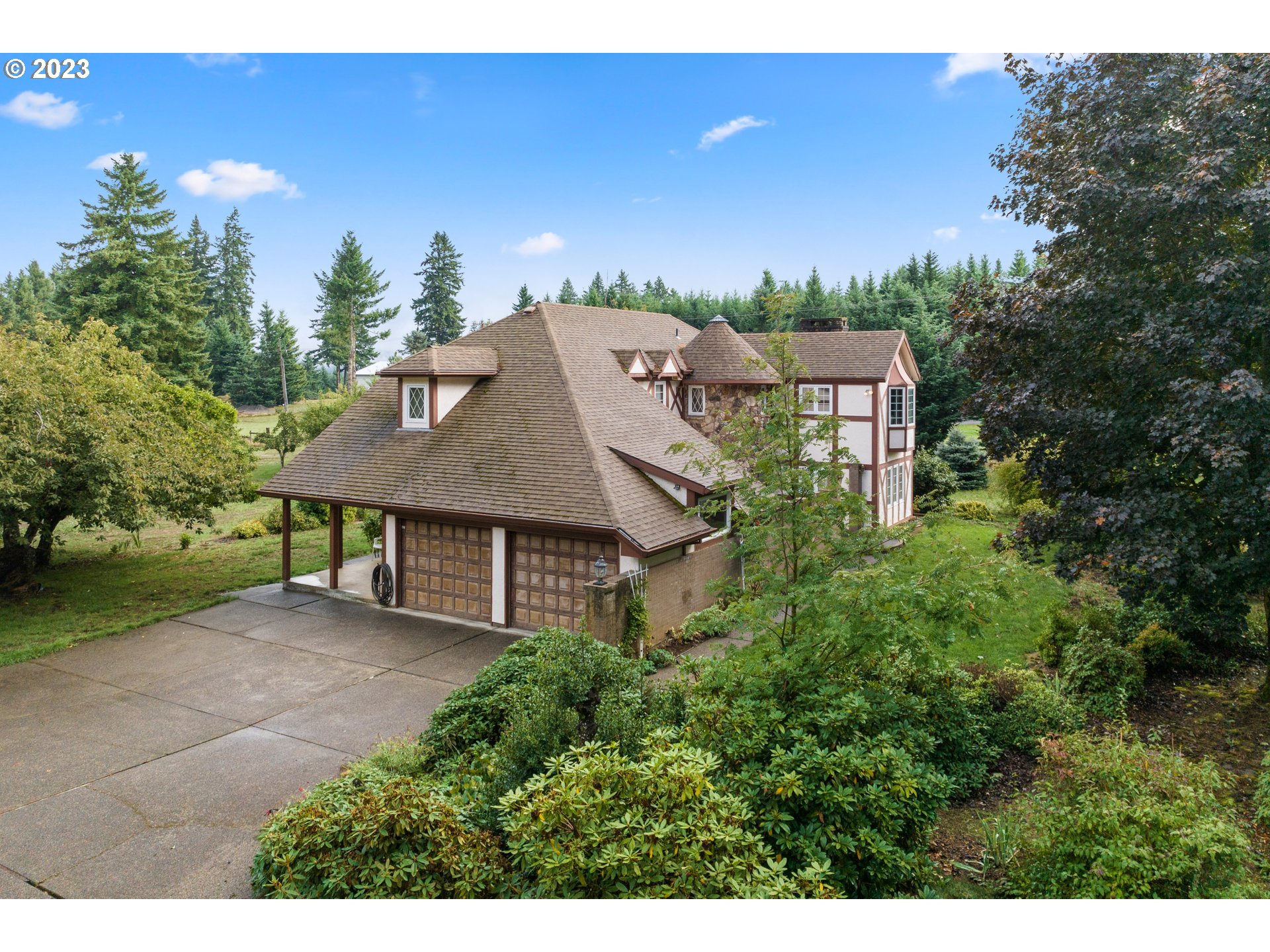 21488 South Springwater Road Estacada, OR 97023 - Photo 1 of 37 a view of a house with a yard and tree s