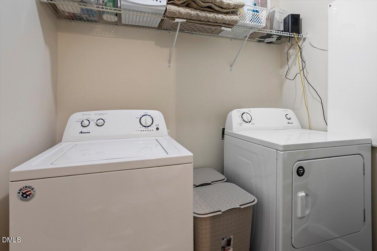 205 Battery Way Bunnlevel, NC 28323 - Photo 35 of 37 a utility room with dryer and washer