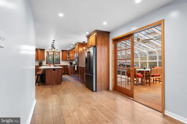 a bathroom with a sink toilet and a mirror
