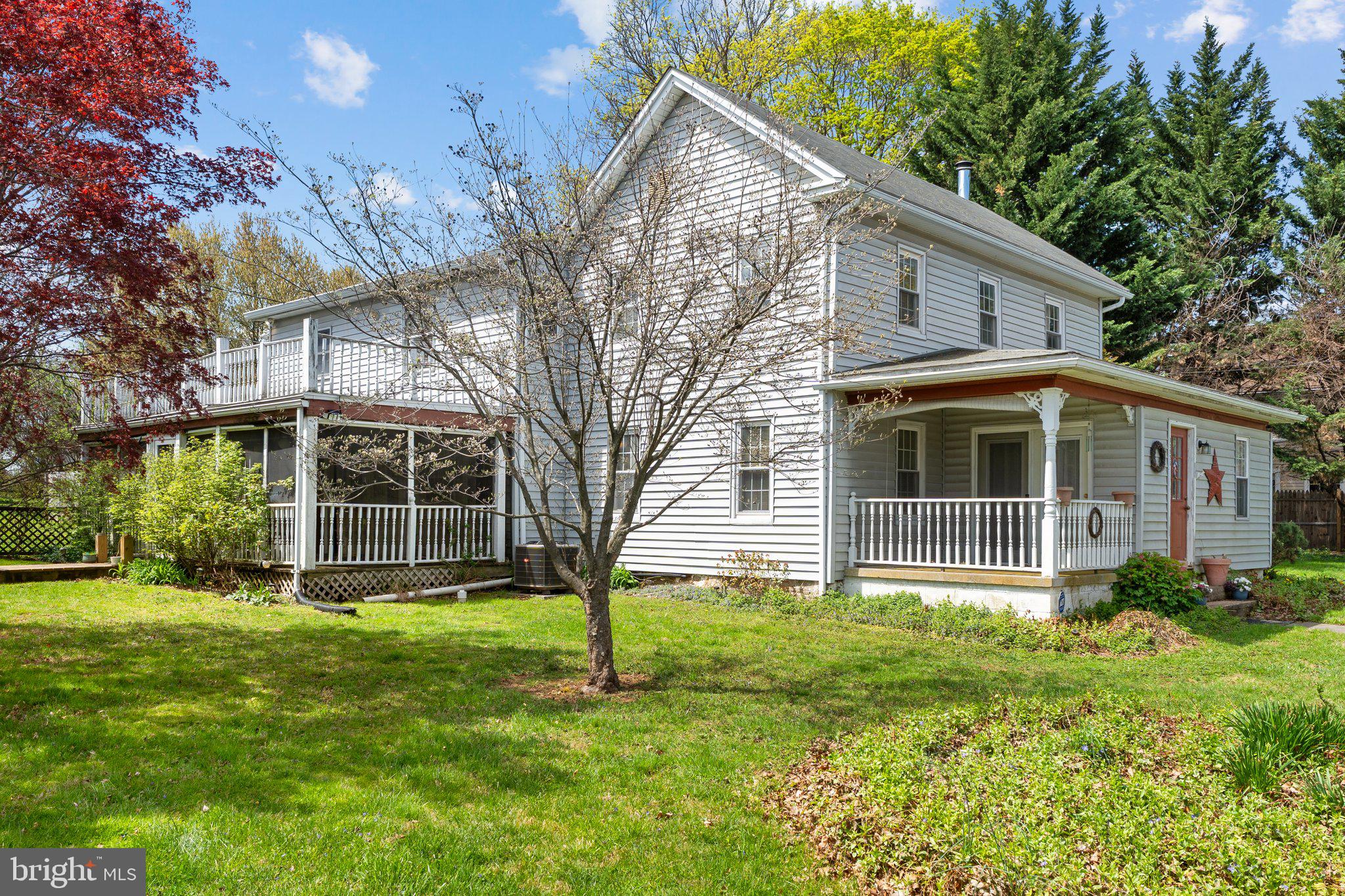 15921 Frederick Road Woodbine, MD 21797 - Photo 3 of 41 Charming home with lush greenery.