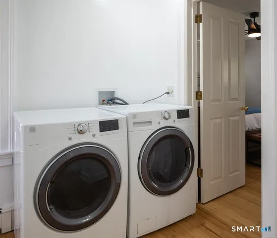 a utility room with dryer and washer