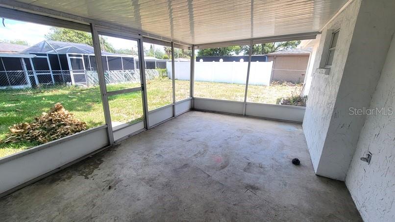 9202 Suffolk Lane Port Richey, FL 34668 - Photo 17 of 20 a view of a room with a large window