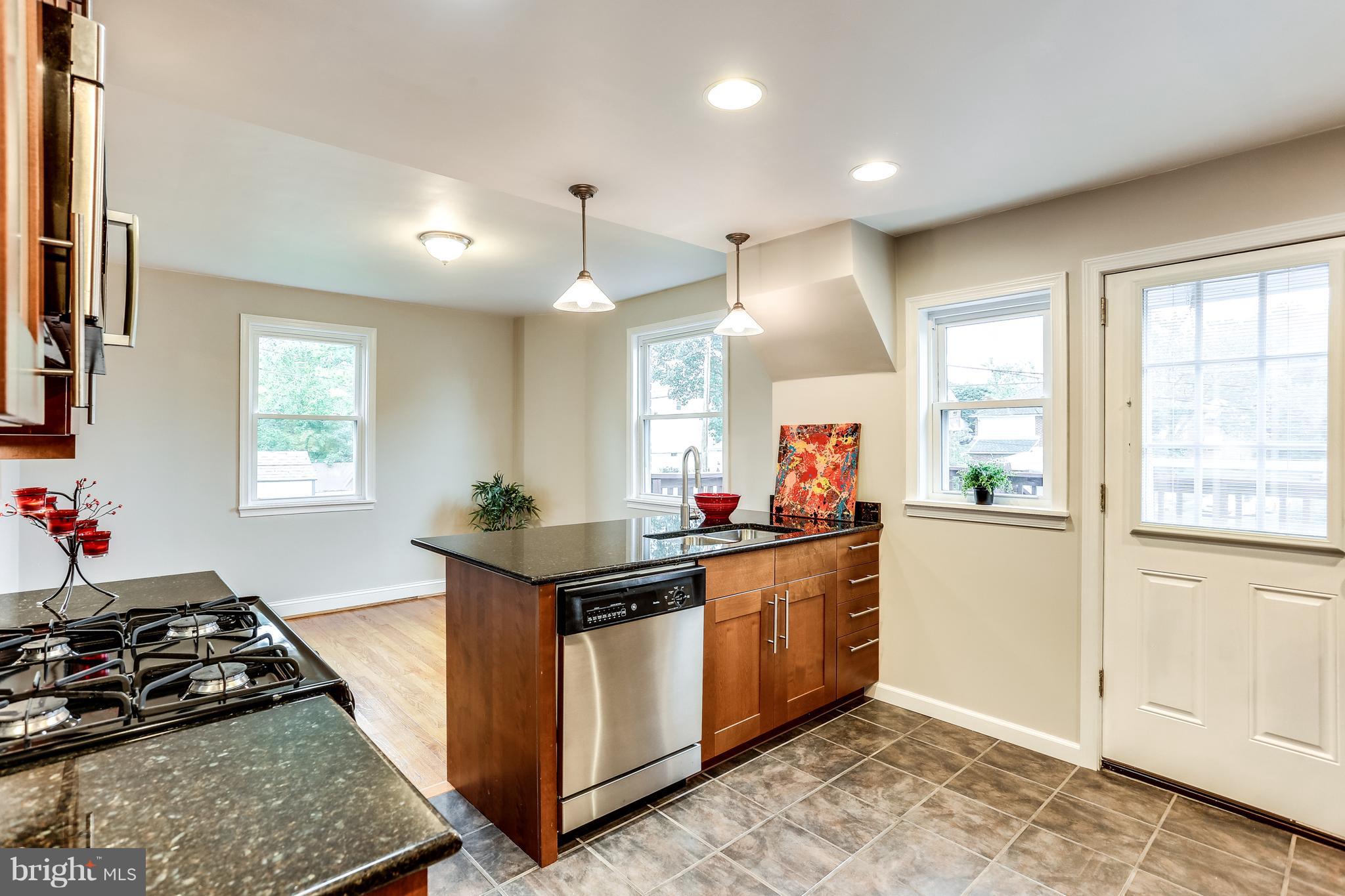 717 Devonshire Road Baltimore, MD 21229 - Photo 11 of 30 Maple cabinets and ceramic floor