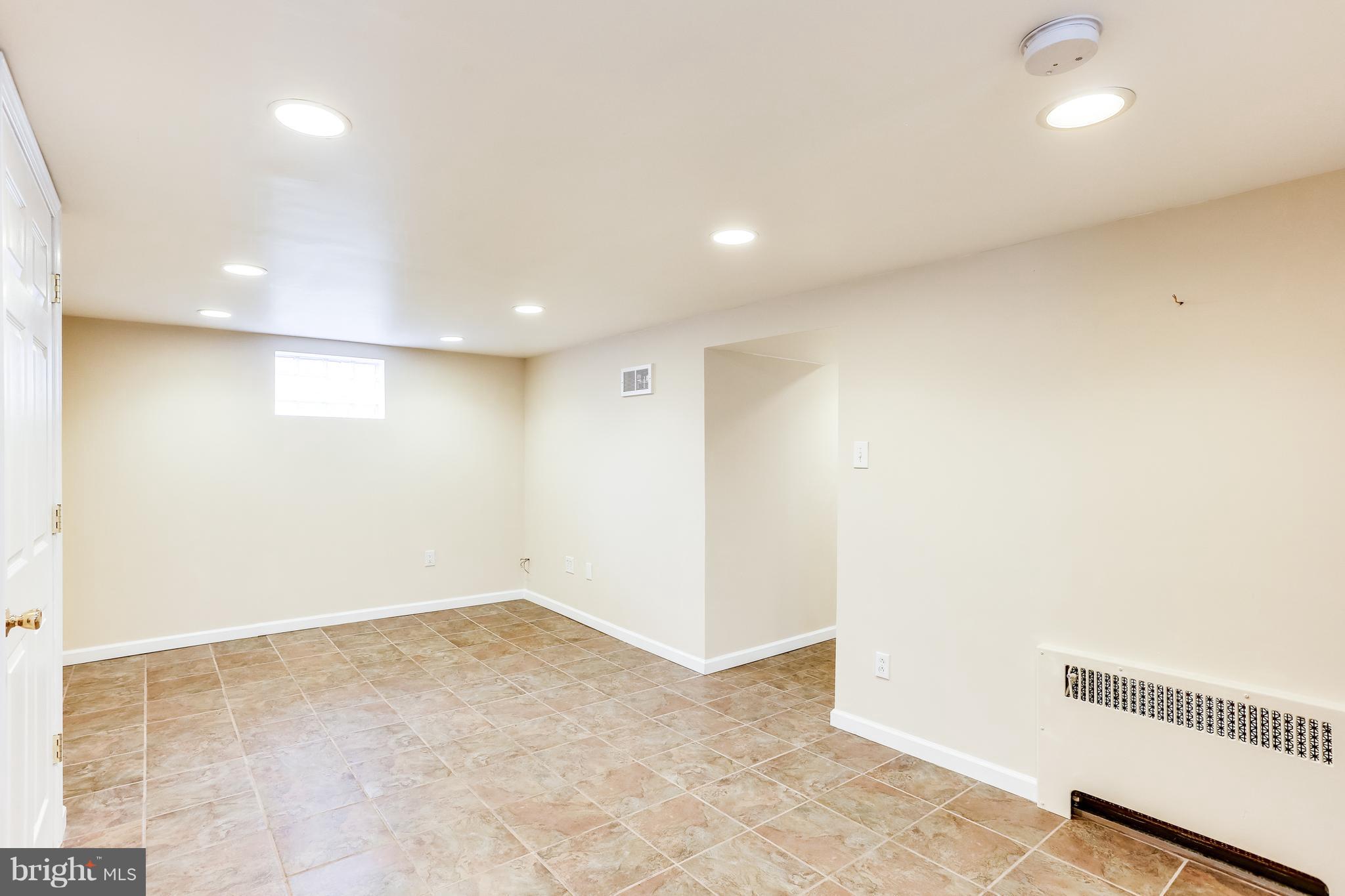 717 Devonshire Road Baltimore, MD 21229 - Photo 22 of 30 Fully finished ground level walk-out basement