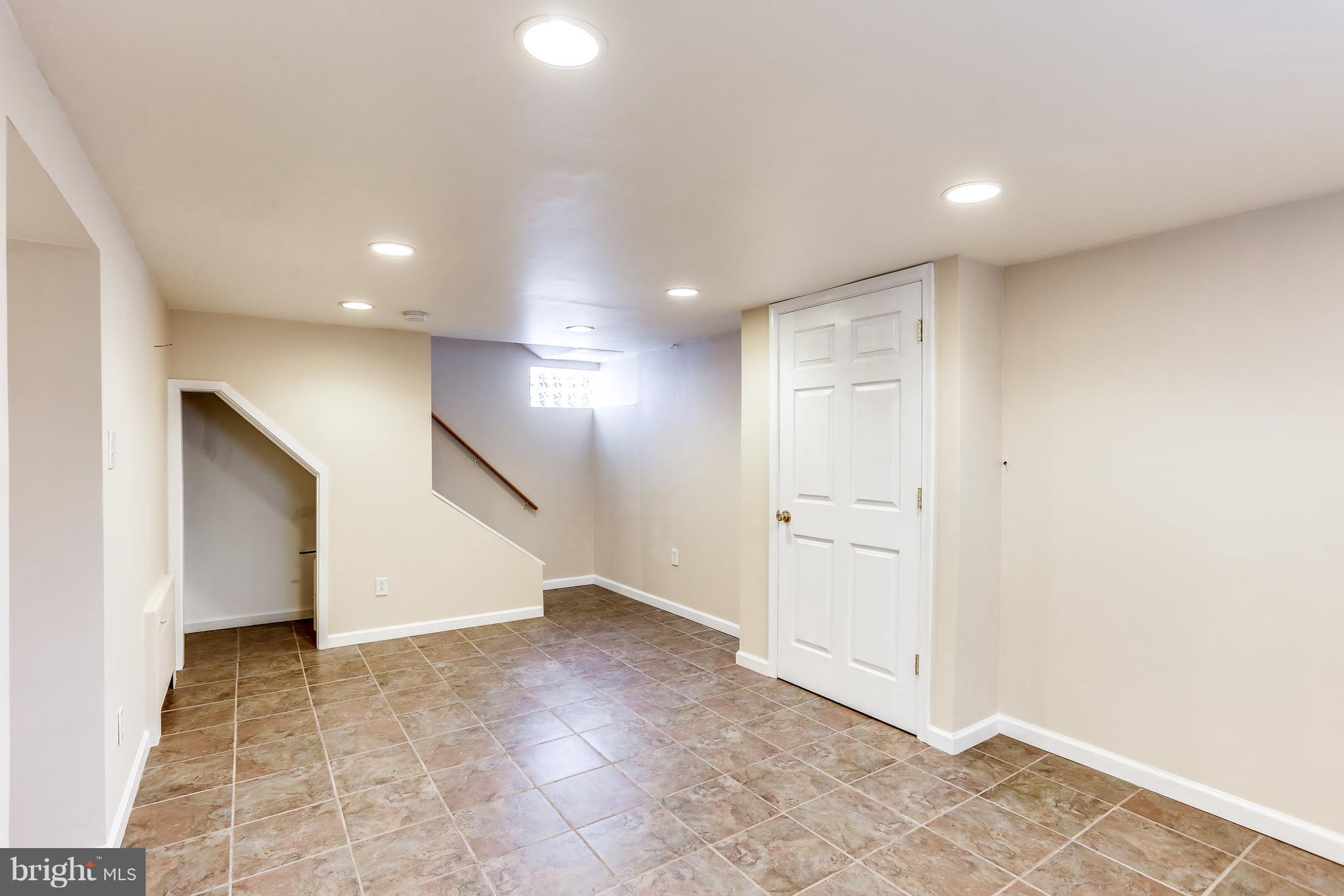 717 Devonshire Road Baltimore, MD 21229 - Photo 23 of 30 Recreation room with ceramic tile floor