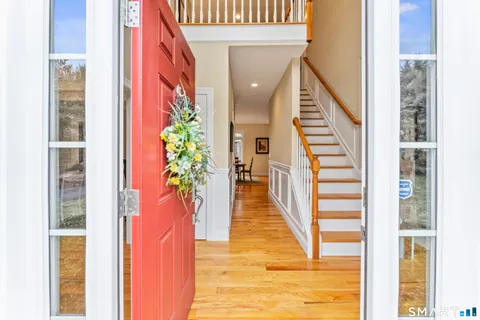 a view of an entryway with staircase