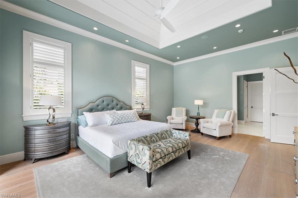 425 Harbour Drive Naples, FL 34103 - Photo 15 of 24 a bedroom with a bed and window