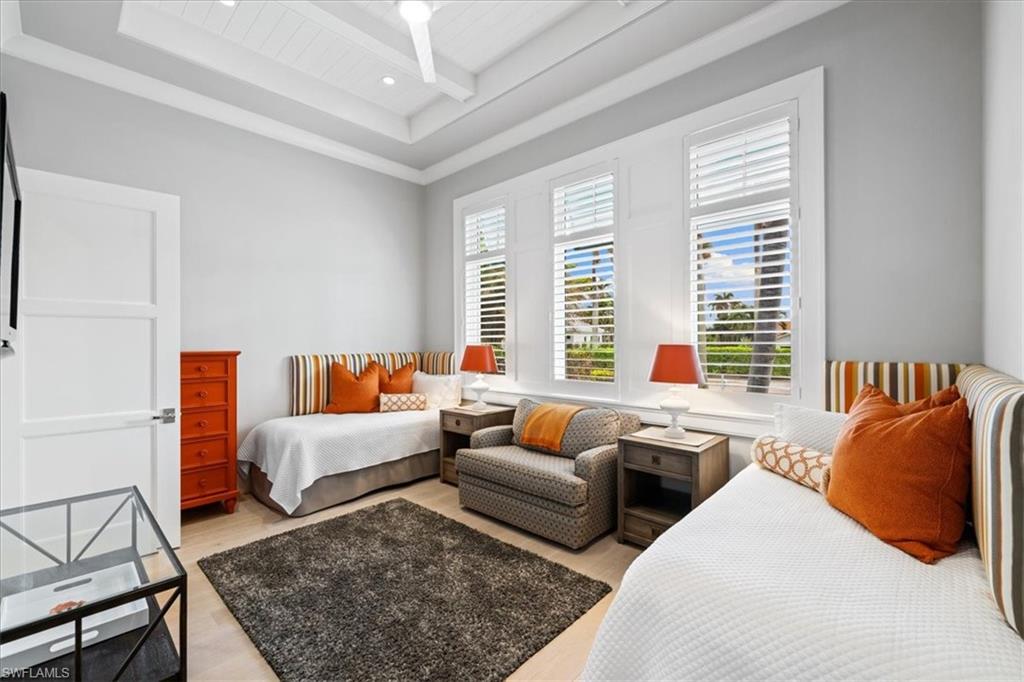 425 Harbour Drive Naples, FL 34103 - Photo 22 of 24 a living room with furniture and a rug