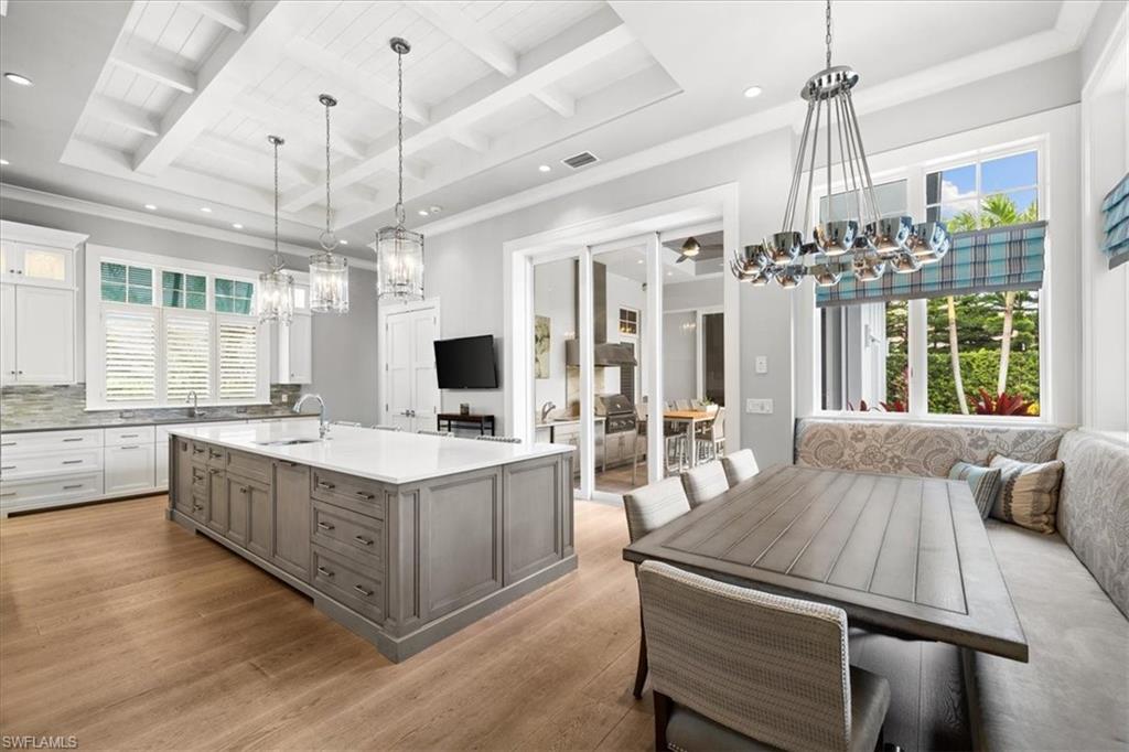 425 Harbour Drive Naples, FL 34103 - Photo 6 of 24 a large white kitchen with a large window