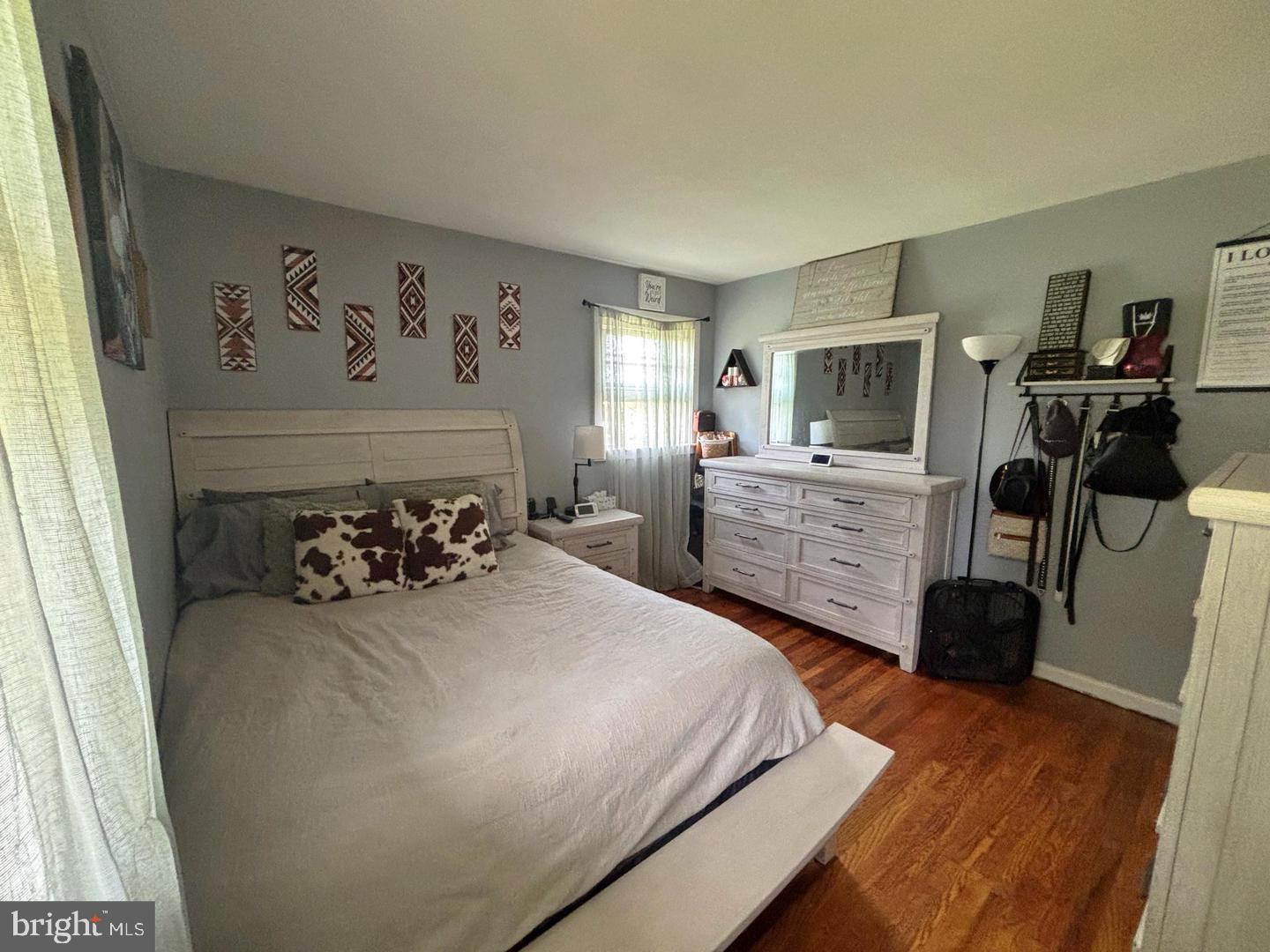28 Pineview Terrace Bridgeton, NJ 08302 - Photo 12 of 37 a bedroom with a bed and a tv on the dresser