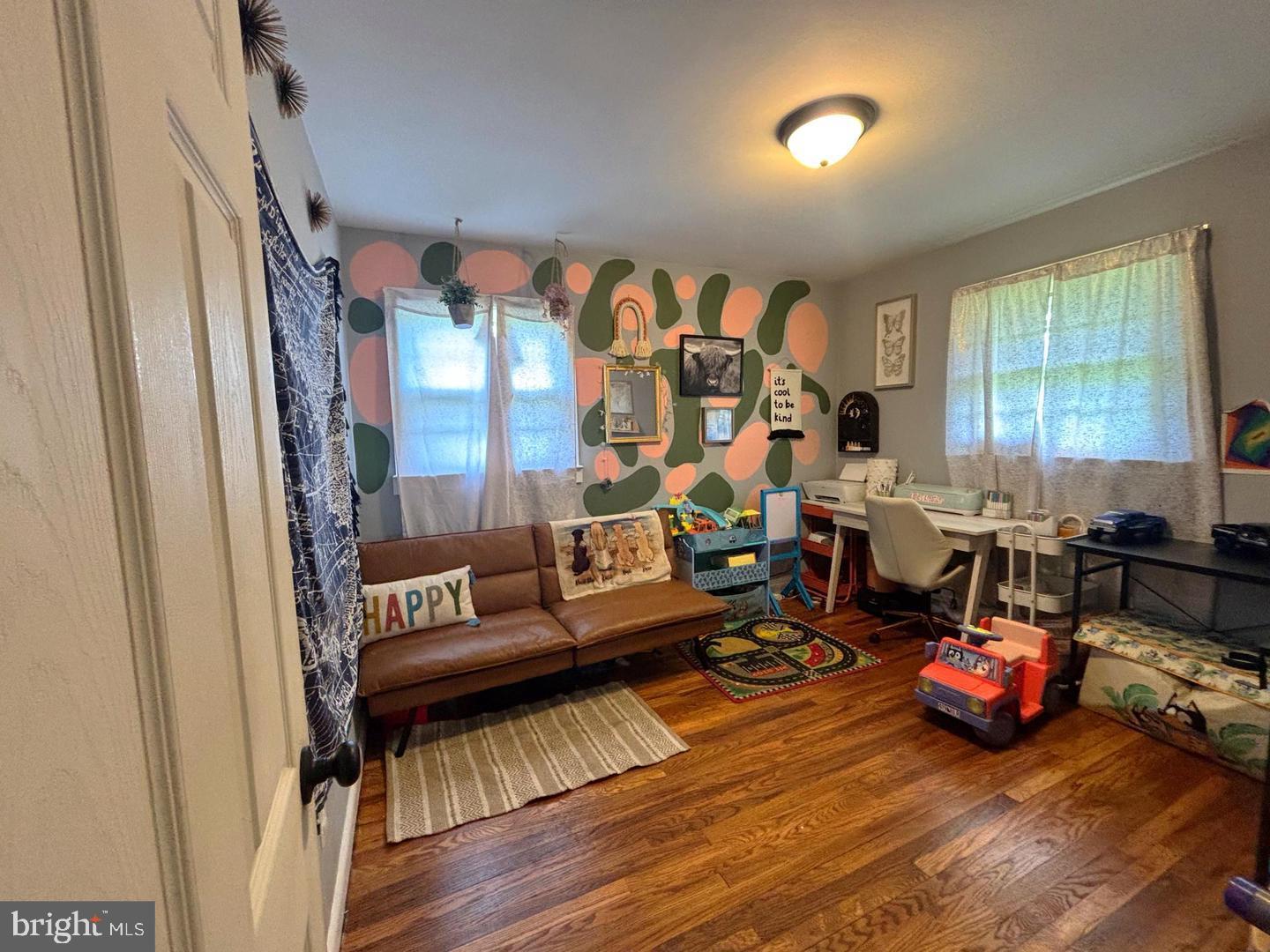 28 Pineview Terrace Bridgeton, NJ 08302 - Photo 7 of 37 a living room with furniture and a wooden floor