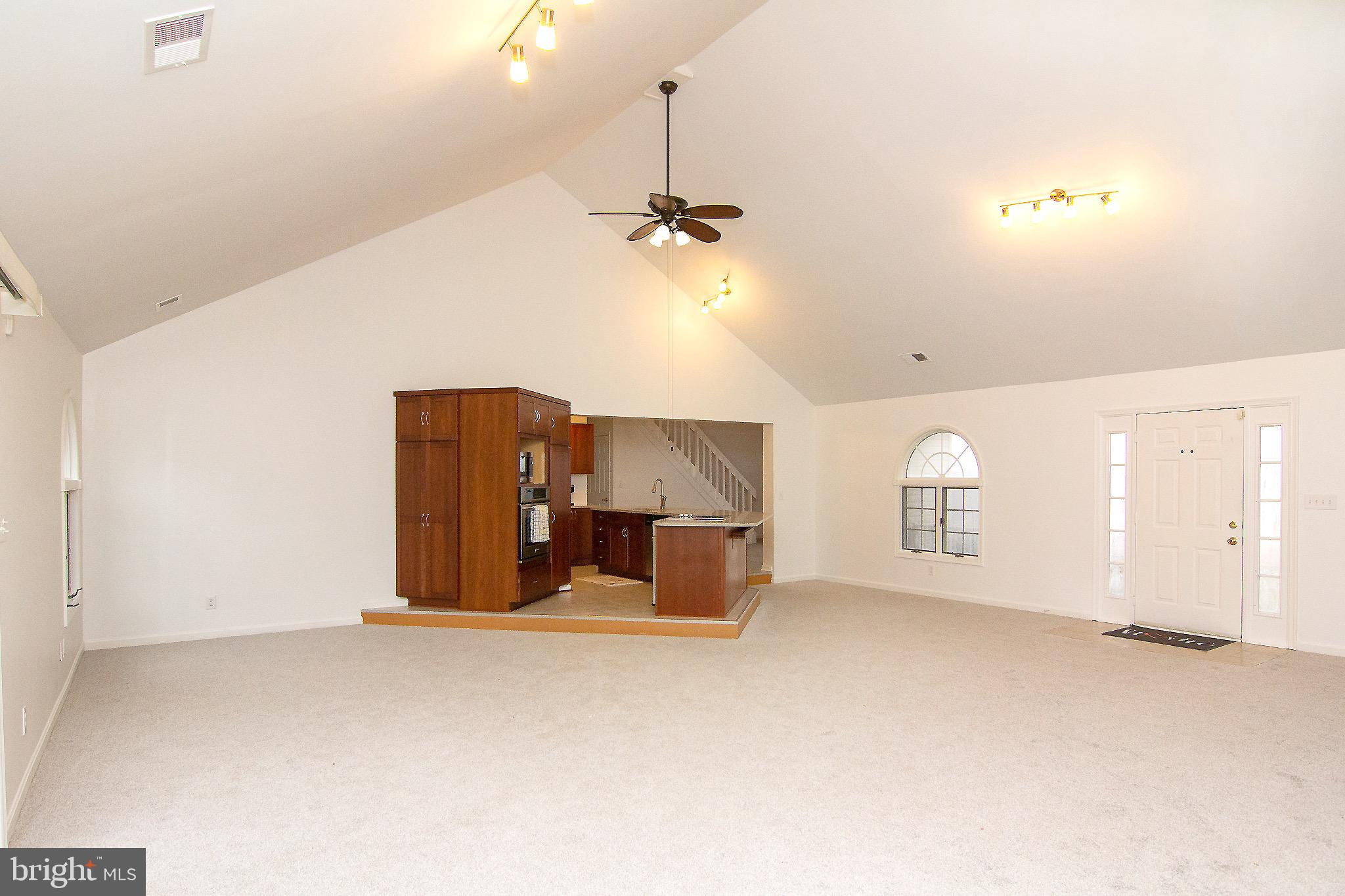 3808 Falls Road Manchester, MD 21102 - Photo 13 of 43 a view of a livingroom with a ceiling fan and window