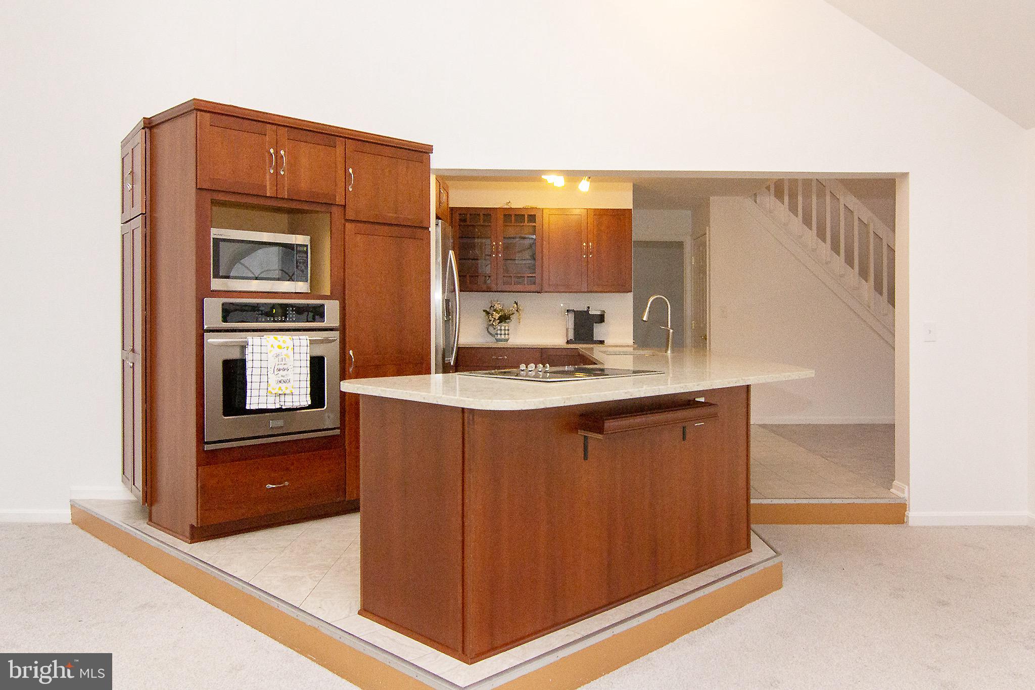 3808 Falls Road Manchester, MD 21102 - Photo 14 of 43 a kitchen with stainless steel appliances granite countertop a sink stove and refrigerator