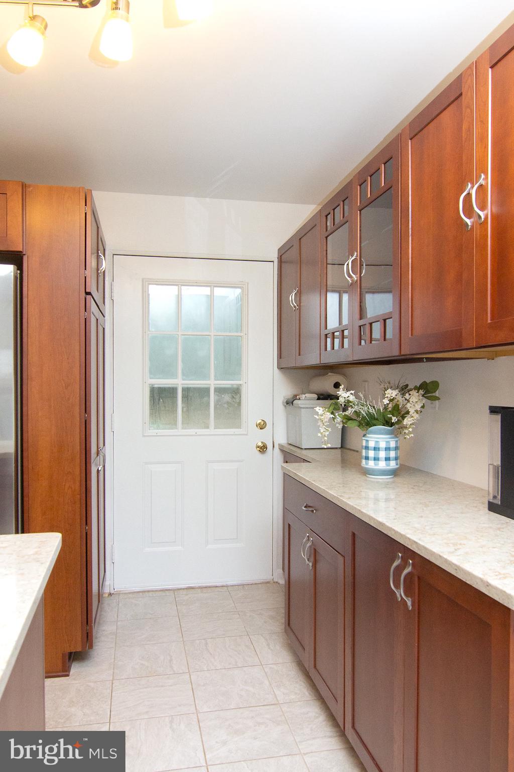 3808 Falls Road Manchester, MD 21102 - Photo 17 of 43 a kitchen with stainless steel appliances granite countertop a refrigerator and cabinets
