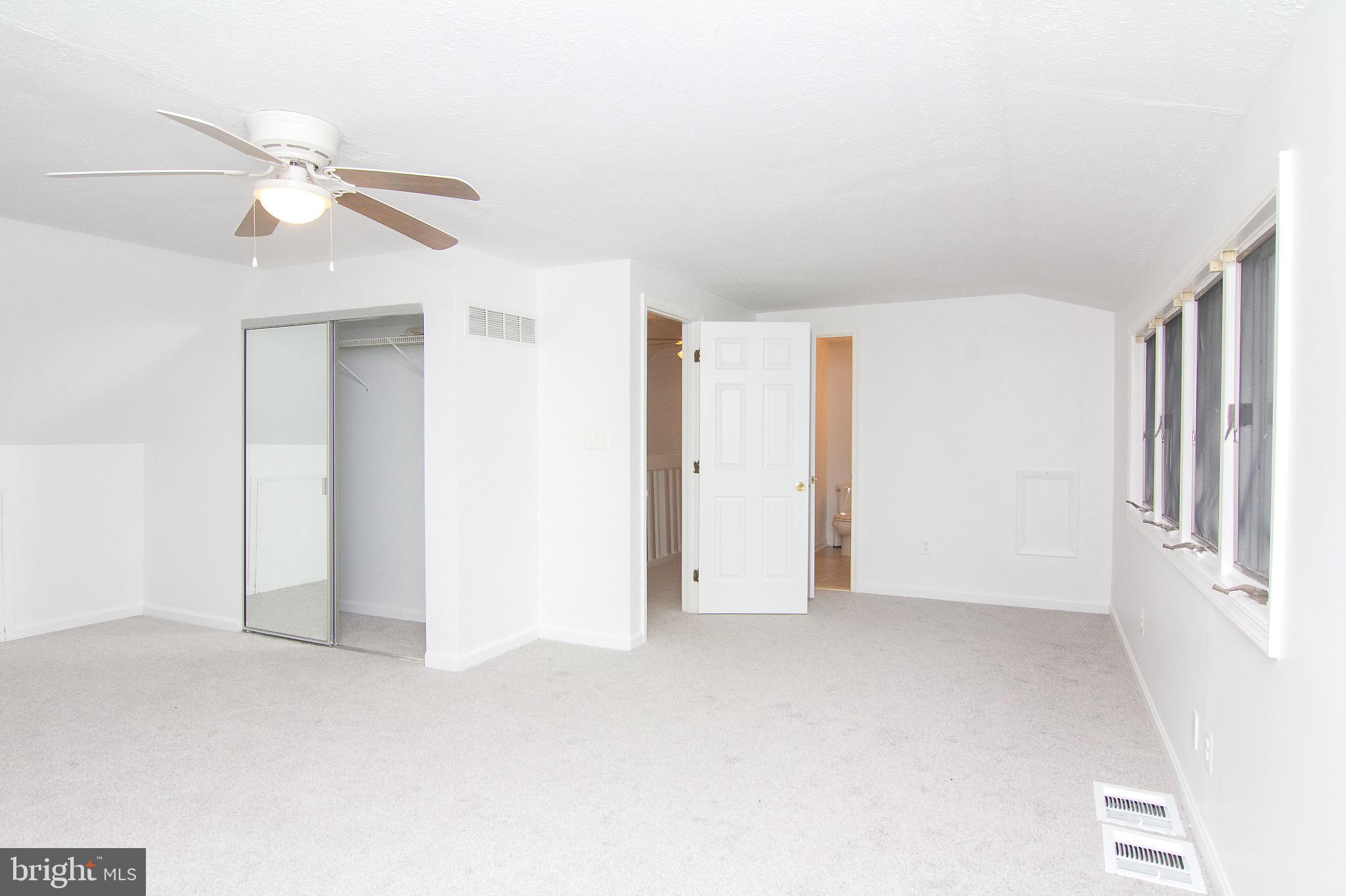 3808 Falls Road Manchester, MD 21102 - Photo 22 of 43 a view of an empty room with a window