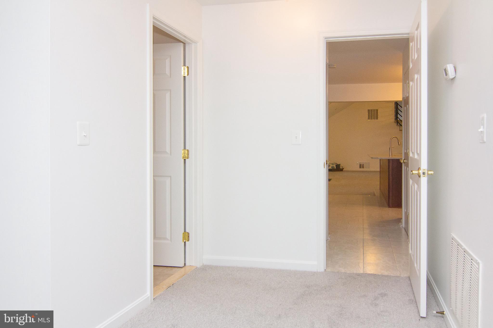 3808 Falls Road Manchester, MD 21102 - Photo 27 of 43 a view of a bathroom from a corridor