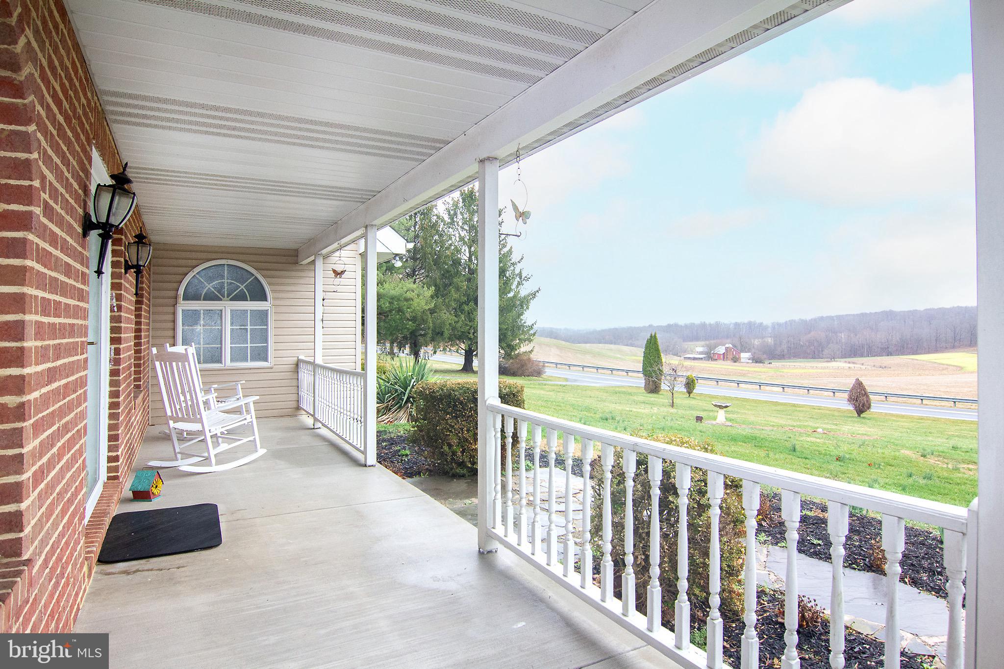 3808 Falls Road Manchester, MD 21102 - Photo 3 of 43 a view of porch with a furniture