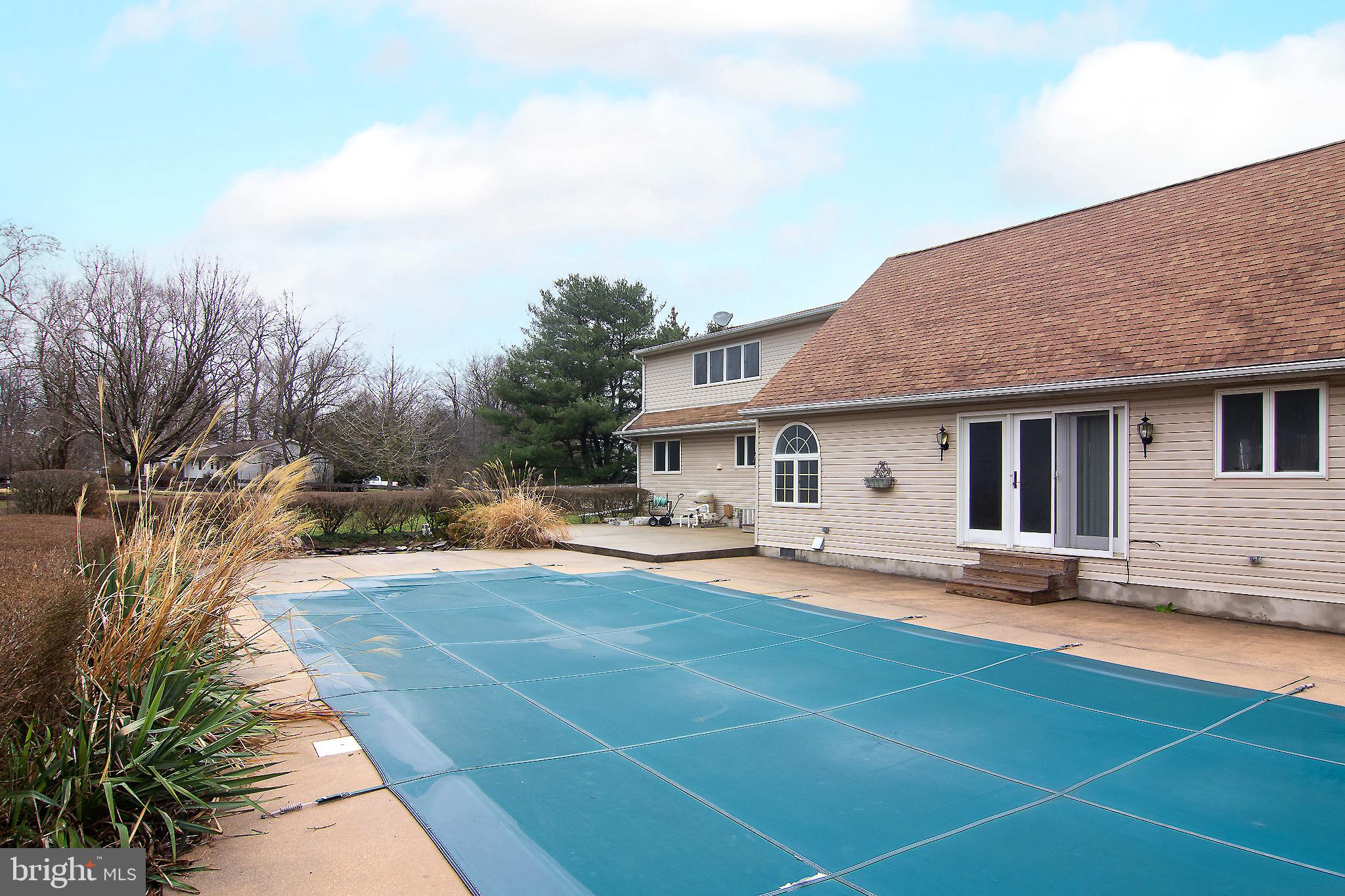 3808 Falls Road Manchester, MD 21102 - Photo 38 of 43 a front view of house with yard and trees in the background