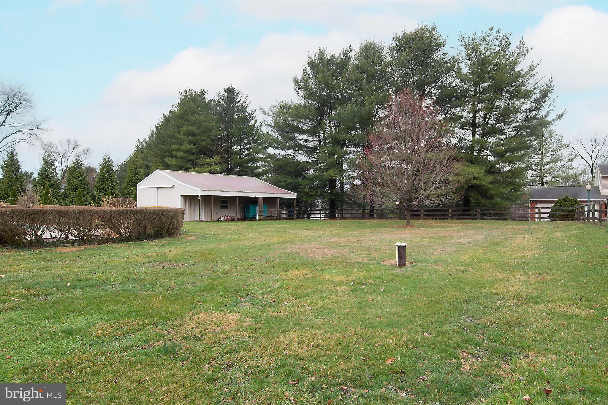 3808 Falls Road Manchester, MD 21102 - Photo 40 of 43 a view of a garden with an outdoor space