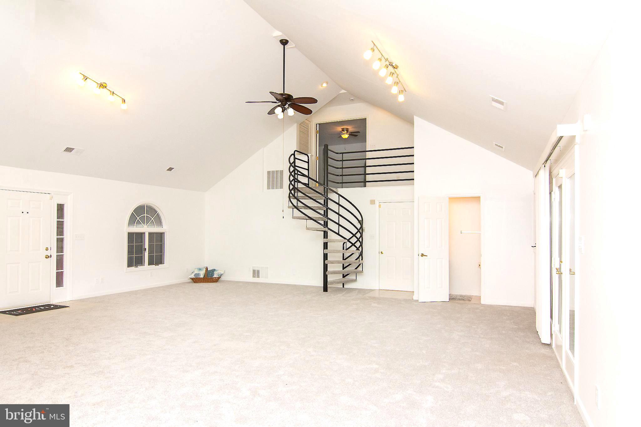 3808 Falls Road Manchester, MD 21102 - Photo 6 of 43 a view of empty room with a ceiling fan