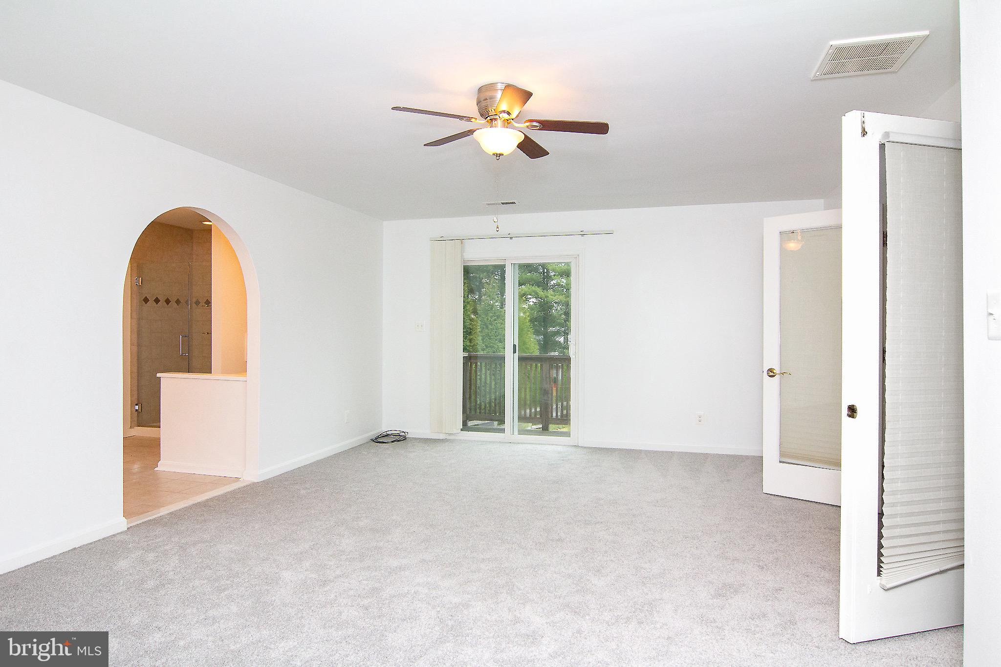 3808 Falls Road Manchester, MD 21102 - Photo 10 of 43 a view of an empty room with a window