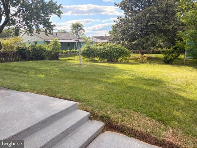 3202 Hayes Street Lanham, MD 20706 - Photo 13 of 15 a view of a house with a yard