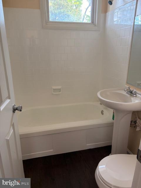 3202 Hayes Street Lanham, MD 20706 - Photo 6 of 15 a bathroom with a sink a toilet and bathtub