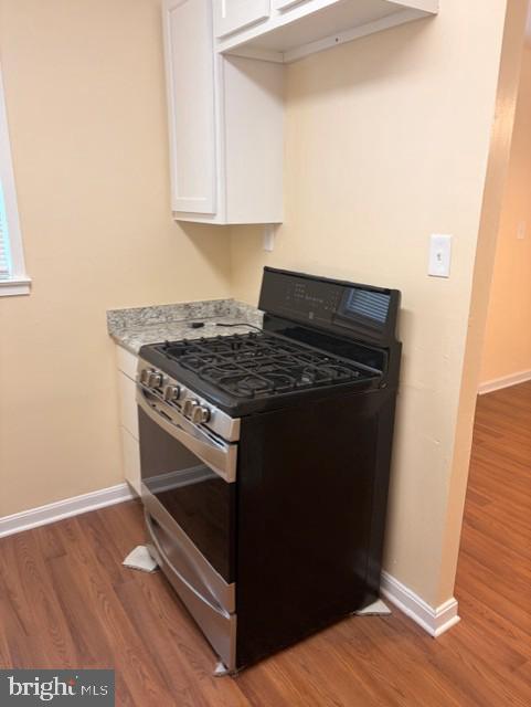 3202 Hayes Street Lanham, MD 20706 - Photo 10 of 15 a stove top oven sitting inside of a kitchen