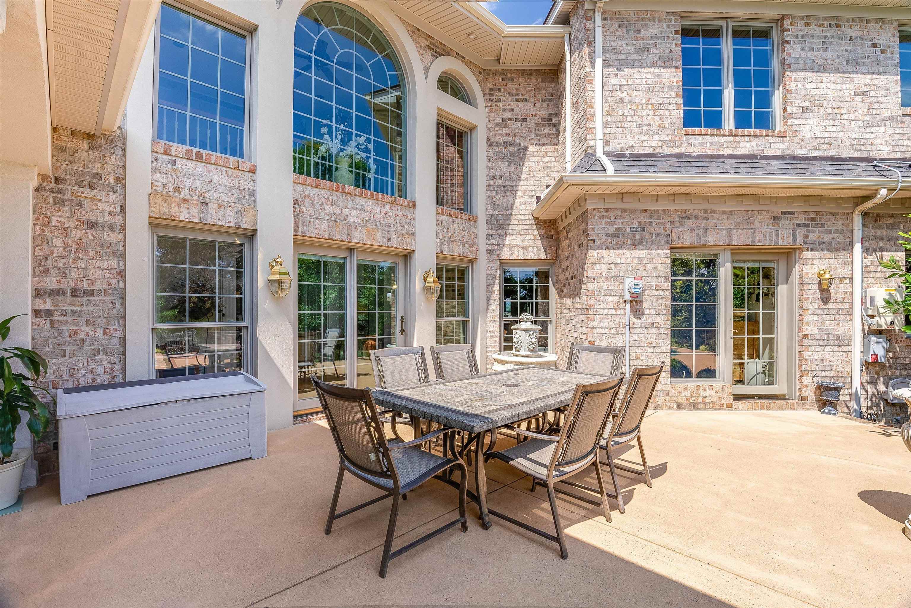 1582 North River Road Mount Crawford, VA 22841 - Photo 12 of 75 a patio with a table and chairs and potted plants