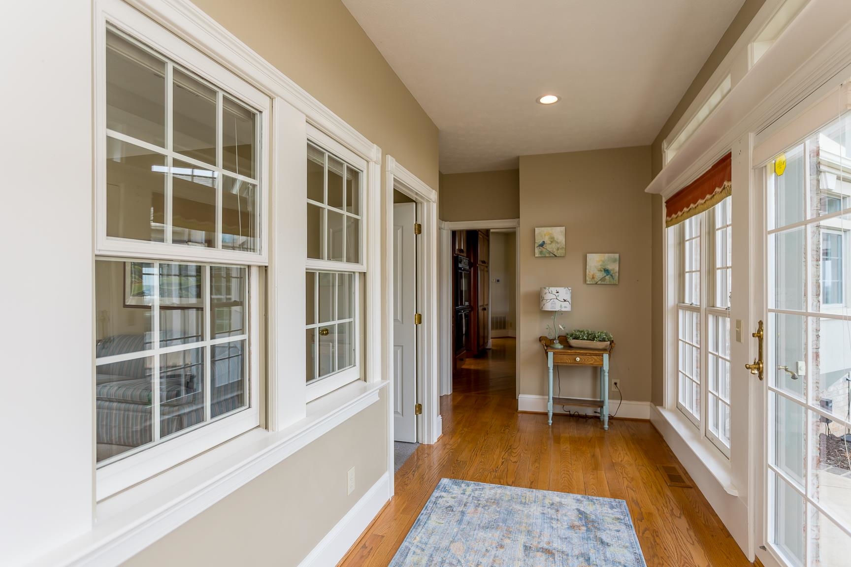 1582 North River Road Mount Crawford, VA 22841 - Photo 49 of 75 a view of a hallway with wooden floor and windows
