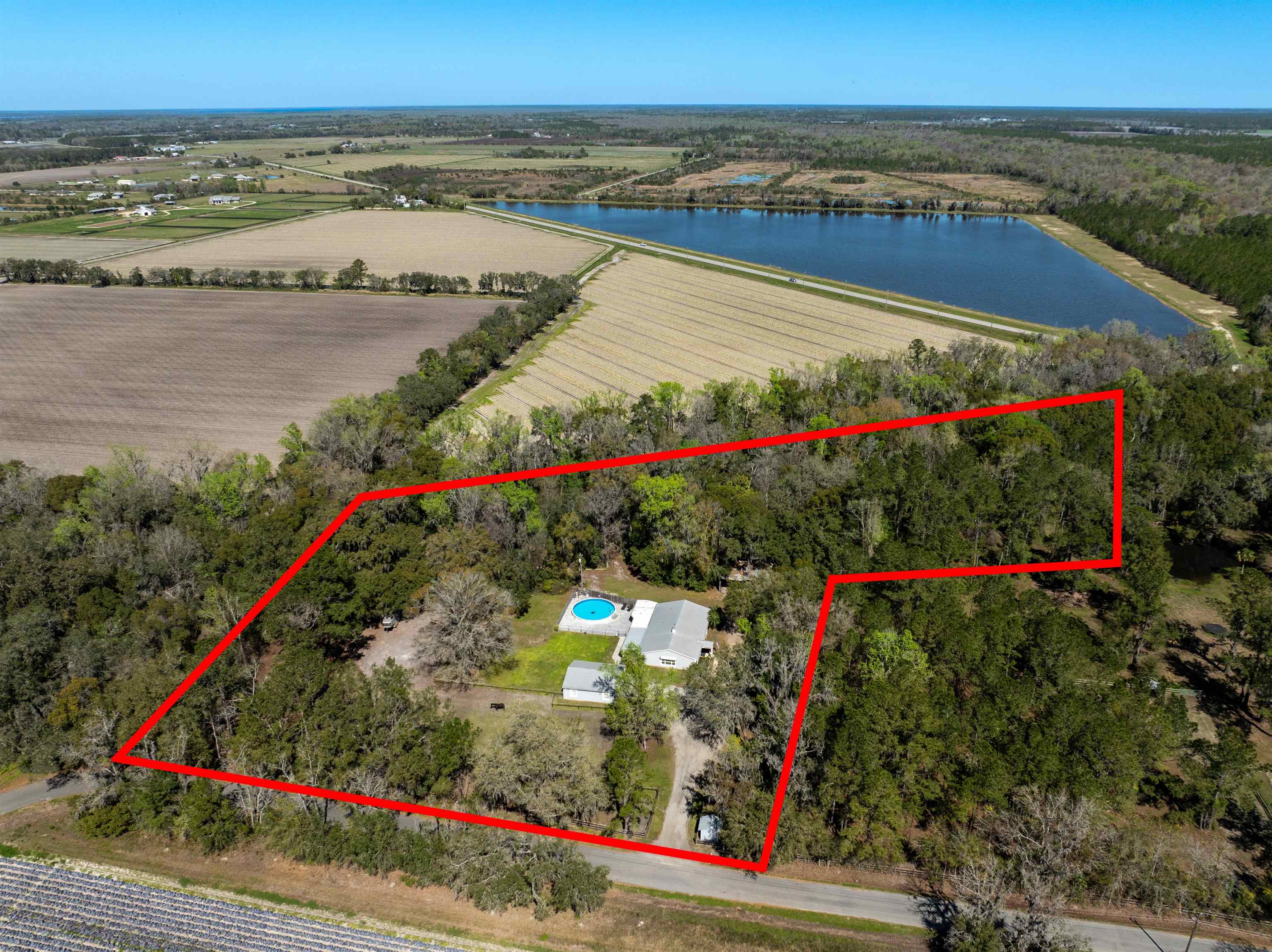 9355 Byrd Road Hastings, FL 32145 - Photo 1 of 59 a view of a city and mountains