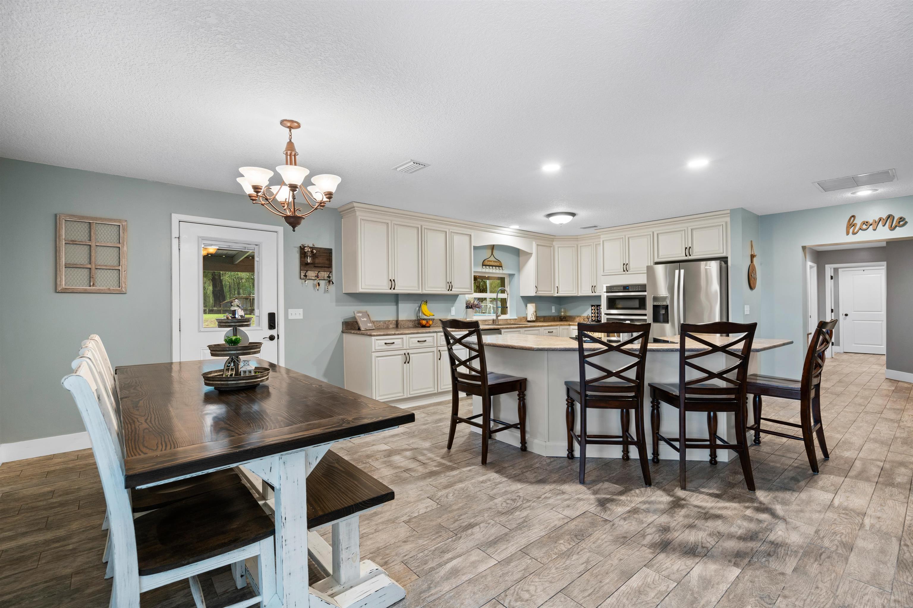 9355 Byrd Road Hastings, FL 32145 - Photo 14 of 59 a view of a dining room with furniture