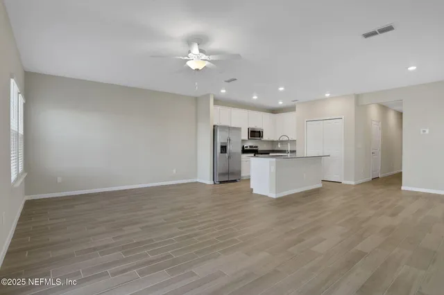 a view of an empty walk in closet