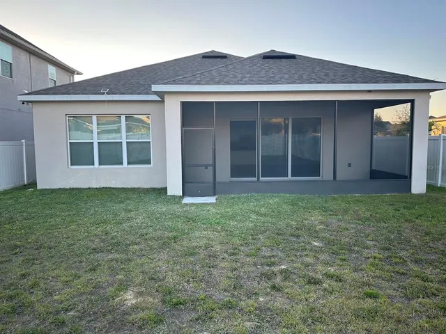 front view of a house and a yard