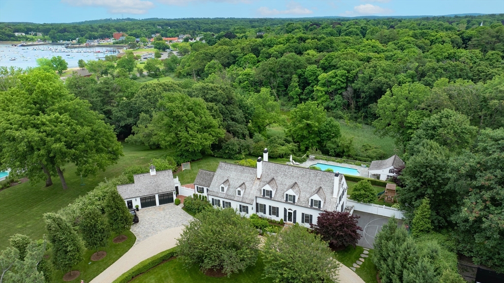 17 Cole Road Hingham, MA 02043 - Photo 1 of 29 an aerial view of a house with yard lake and green space