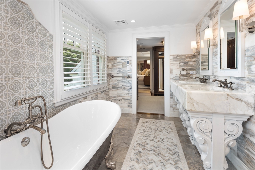 17 Cole Road Hingham, MA 02043 - Photo 14 of 29 a bathroom with a tub sink and mirror