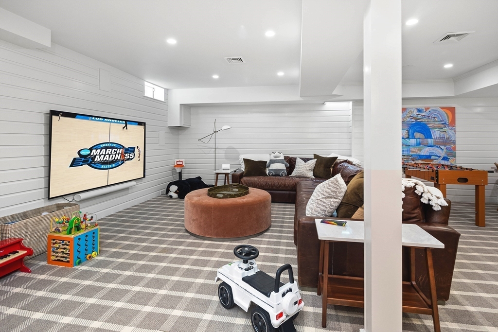 17 Cole Road Hingham, MA 02043 - Photo 19 of 29 a living room with furniture and a flat screen tv