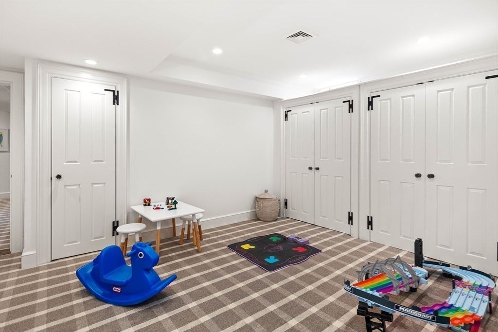 17 Cole Road Hingham, MA 02043 - Photo 20 of 29 a living room with furniture and a rug