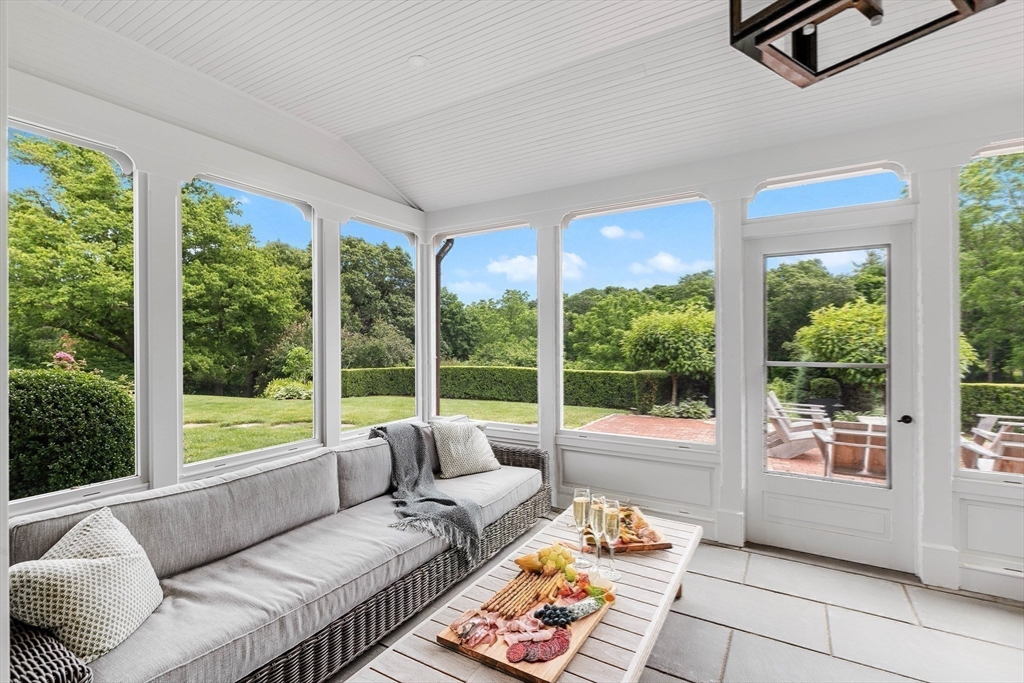17 Cole Road Hingham, MA 02043 - Photo 23 of 29 a living room with furniture and floor to ceiling windows