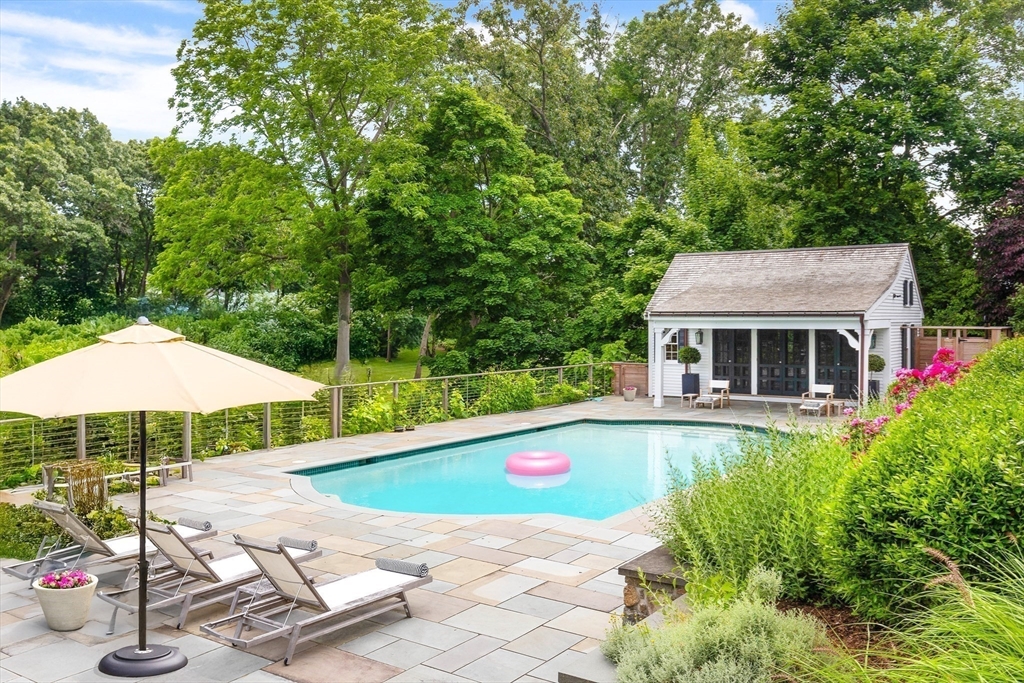 17 Cole Road Hingham, MA 02043 - Photo 25 of 29 a view of pool with table and chairs under an umbrella