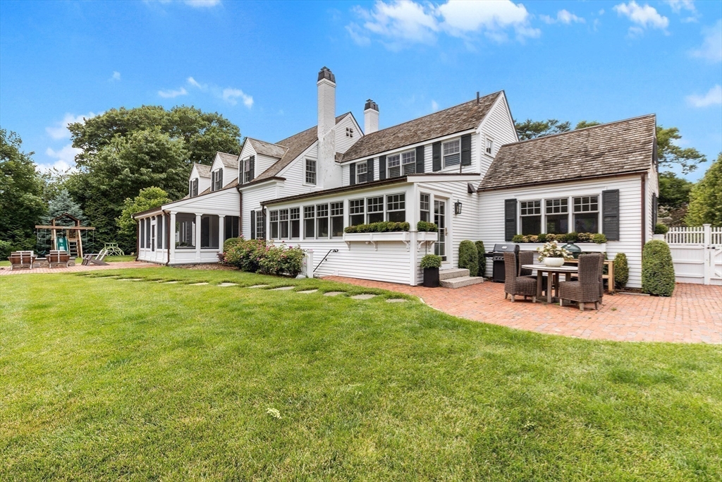 17 Cole Road Hingham, MA 02043 - Photo 29 of 29 a view of a house with a yard patio and sitting area
