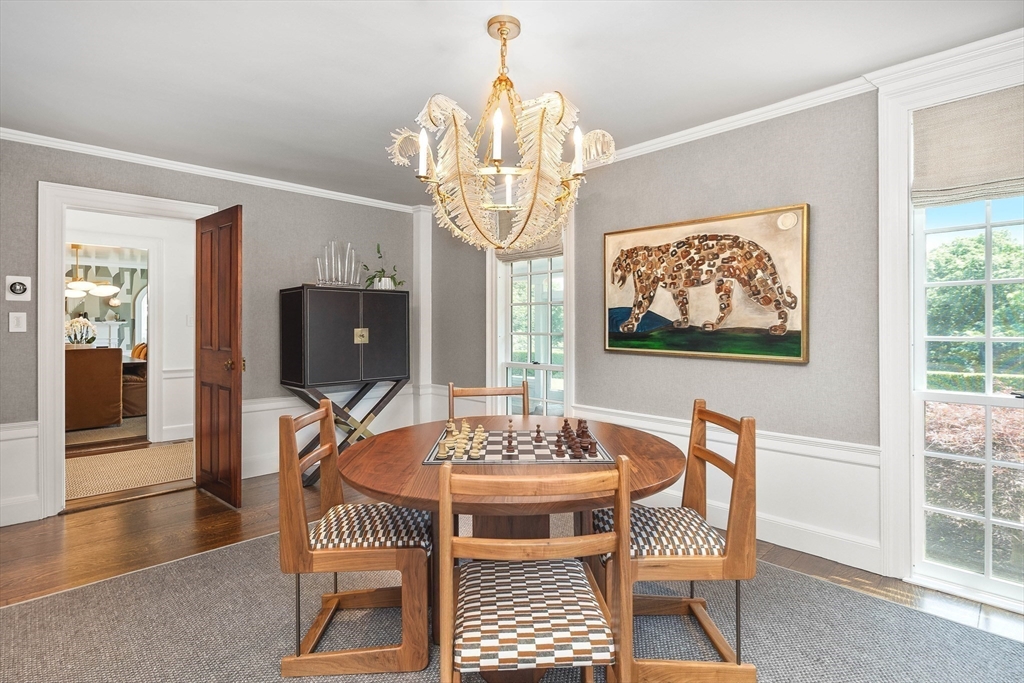 17 Cole Road Hingham, MA 02043 - Photo 8 of 29 a view of a dining room with furniture wooden floor and chandelier