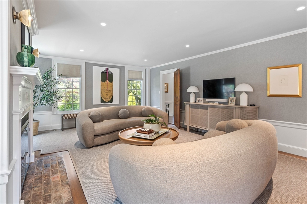 17 Cole Road Hingham, MA 02043 - Photo 9 of 29 a living room with furniture flat screen tv and a large window