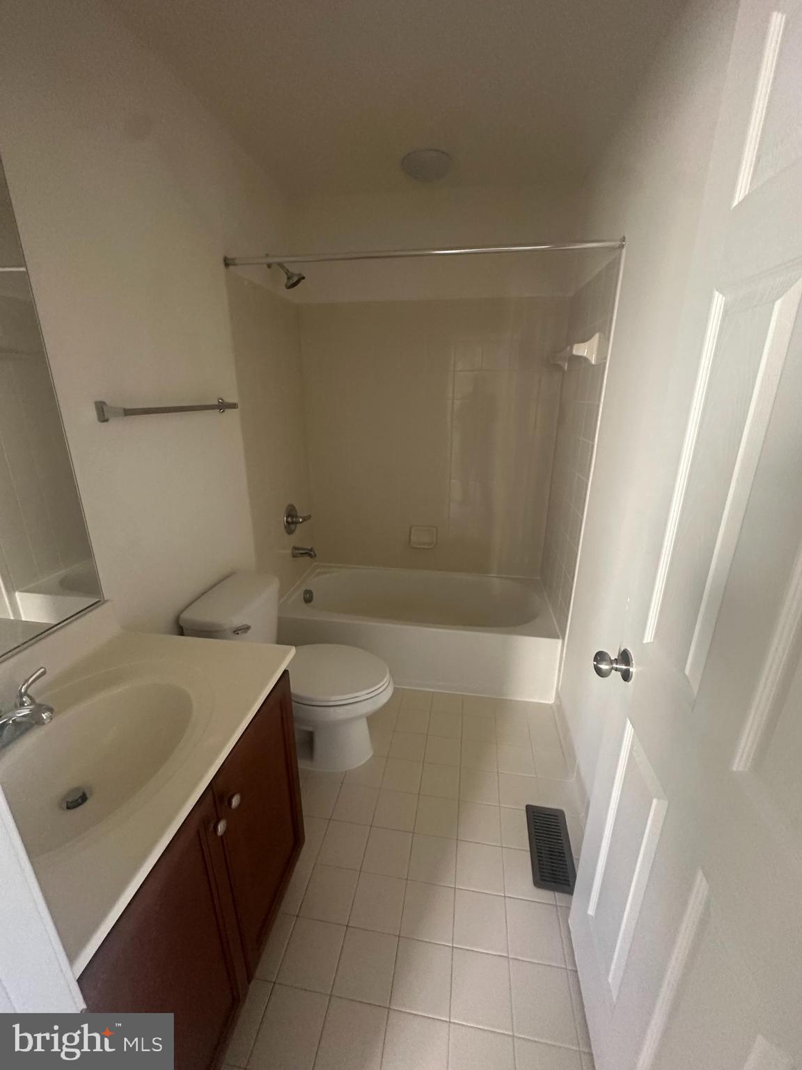 15715 John Diskin Circle Woodbridge, VA 22191 - Photo 4 of 21 a bathroom with a sink a toilet and shower