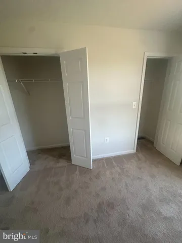 an empty room with closet
