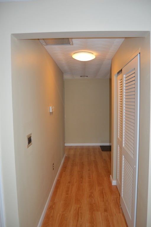 59 Joseph Road Framingham, MA 01701 - Photo 11 of 30 a view of hallway with wooden floor