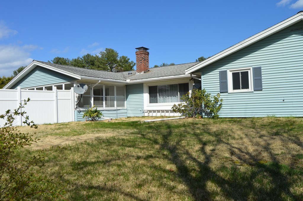 59 Joseph Road Framingham, MA 01701 - Photo 19 of 30 a front view of a house with a yard