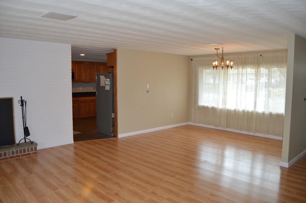 59 Joseph Road Framingham, MA 01701 - Photo 10 of 30 a view of livingroom with hardwood floor and window