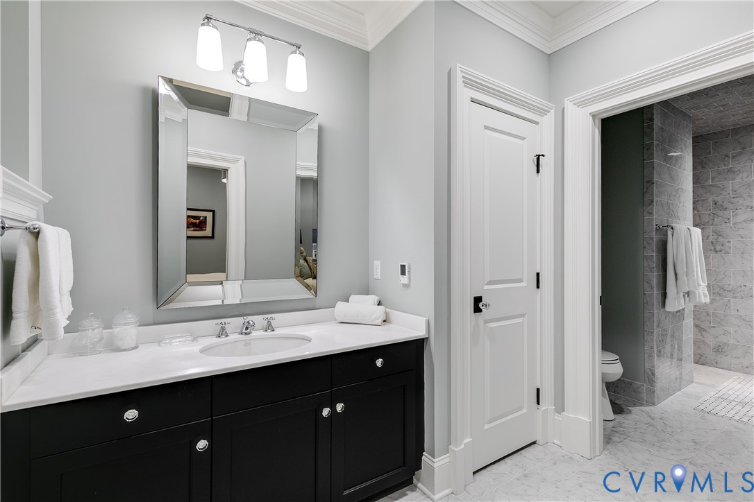 202 Kinloch Road Manakin-Sabot, VA 23103 - Photo 36 of 51 a bathroom with a sink vanity and a mirror