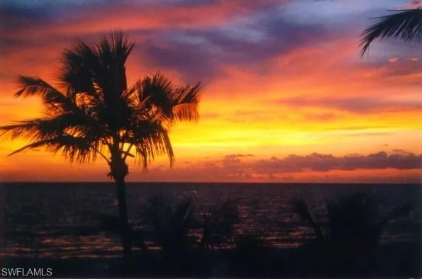 a view of multiple houses with a street